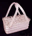 Llewellyn-Uniquely shaped white lucite bag