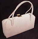 Embossed white vinyl handbag