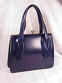 Francois of California Navy vinyl handbag with Loop front handle embellishment 